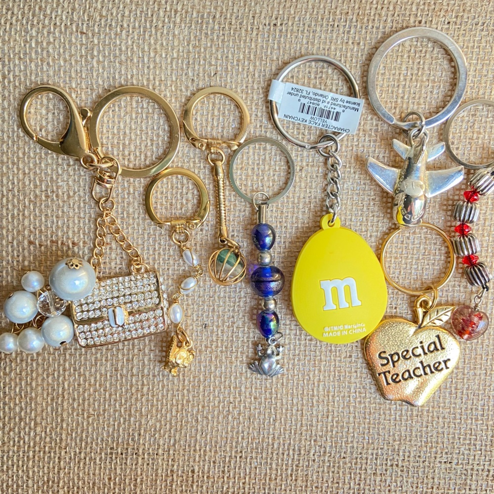 Lot of key chains rings with faux pearls bag airplane teacher in mixed tones